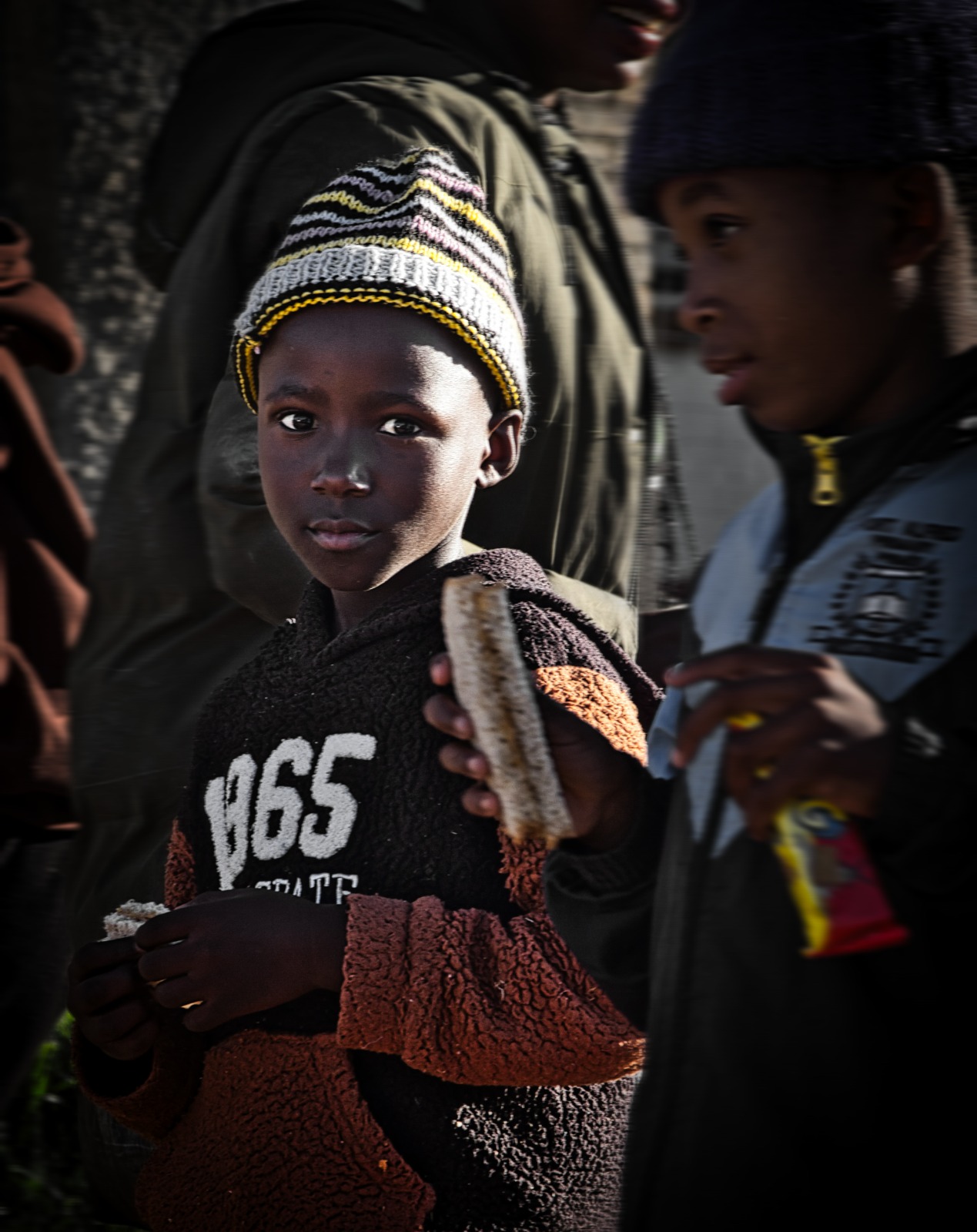 Boy with a sandwich on the route