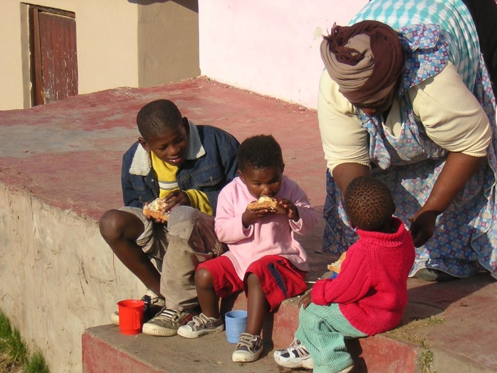 Community members sharing a meal together