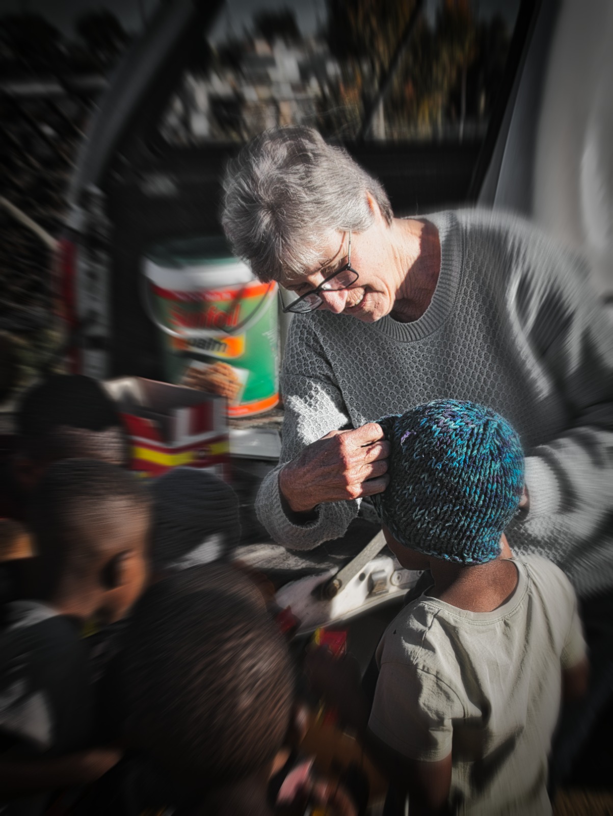 Volunteer handing out supplies