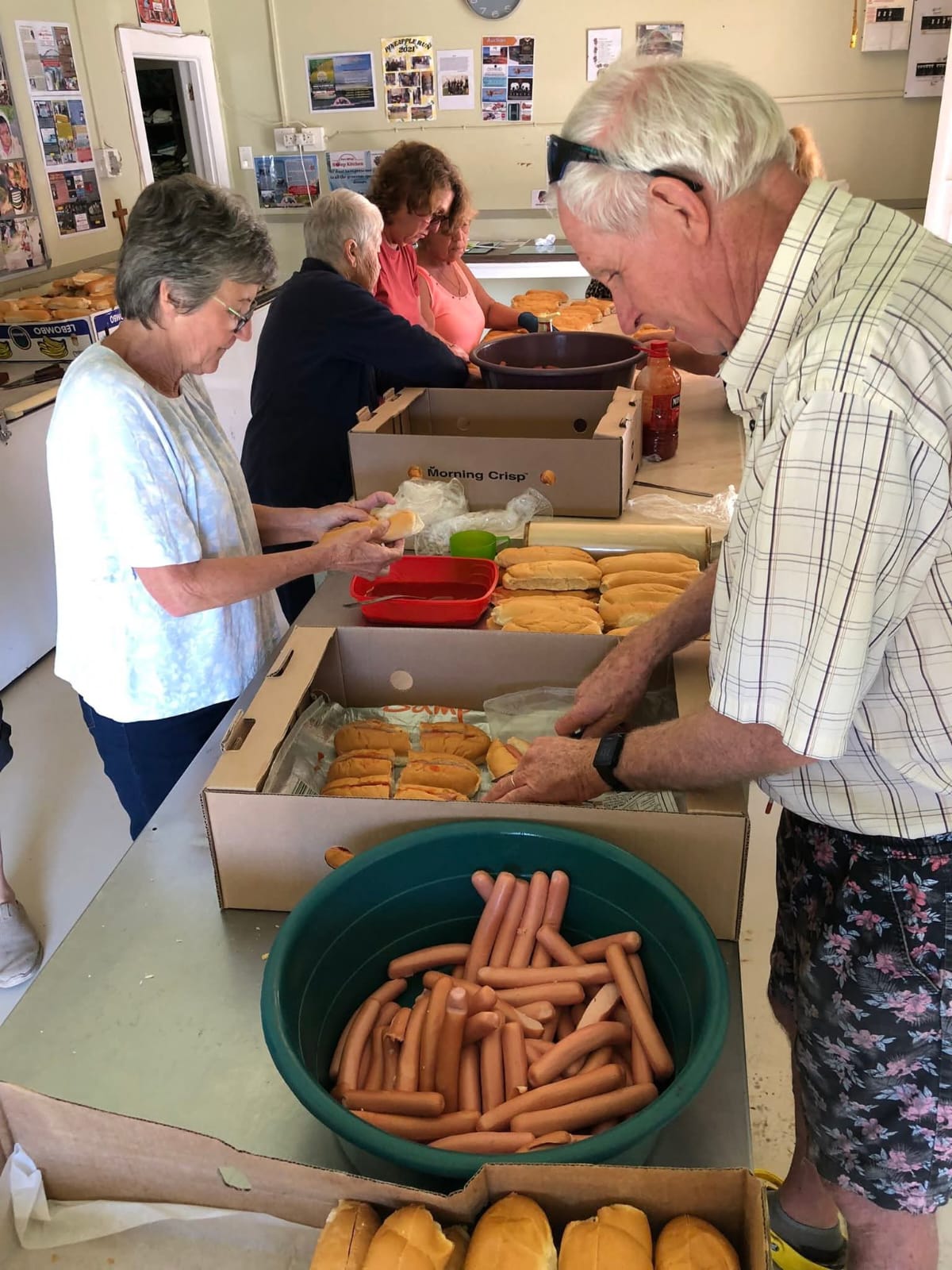 Volunteers preparing rolls